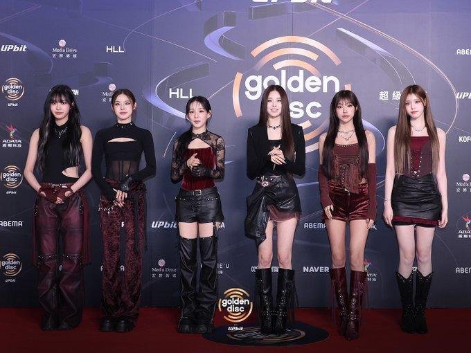 izna K-pop group dark edgy red carpet look Golden Disc Awards 2026 fashionable outfits
