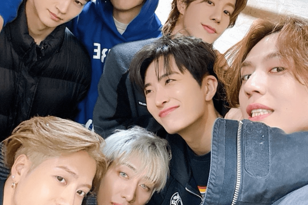 The members of K-pop group GOT7 together after leaving their original agency to continue as an independent group while keeping their name