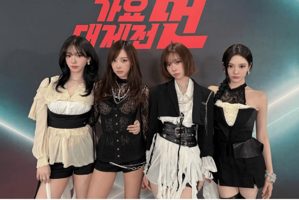 Fourth generation K-pop group aespa in their futuristic Y3K metaverse aesthetic, leaders of the experimental AI idol concept.