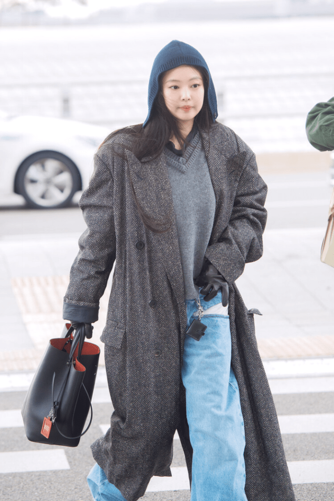 Jennie Kim of Blackpink airport fashion 2026 wearing oversized knits at ICN Airport