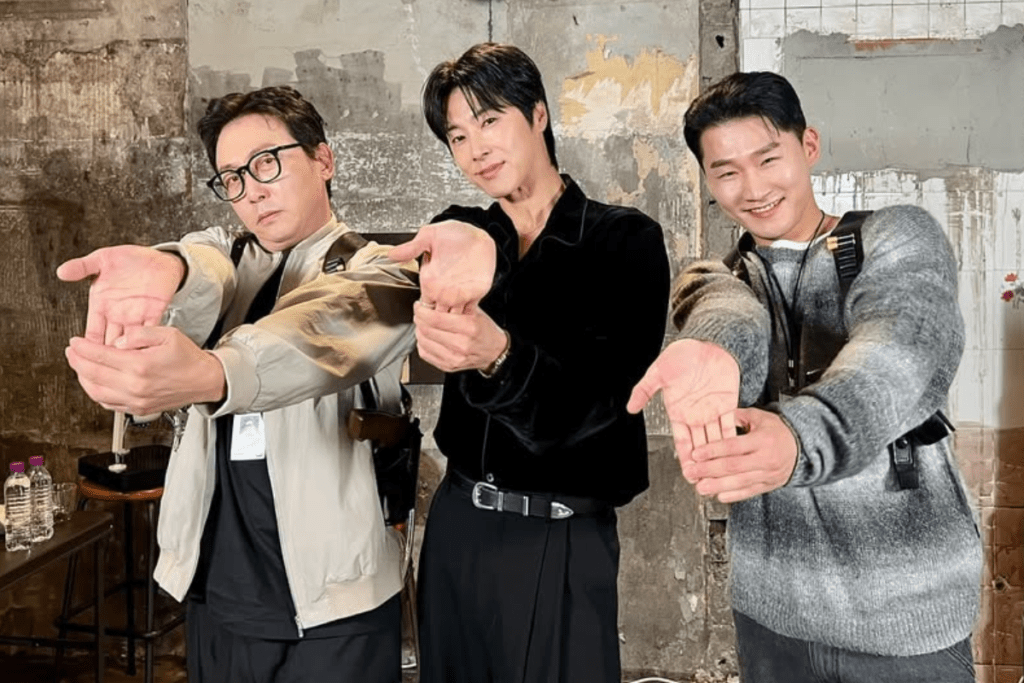 K-pop group TVXQ performing, representing the historical context of K-pop contract lengths and the Fair Trade Commission’s 7-year rule