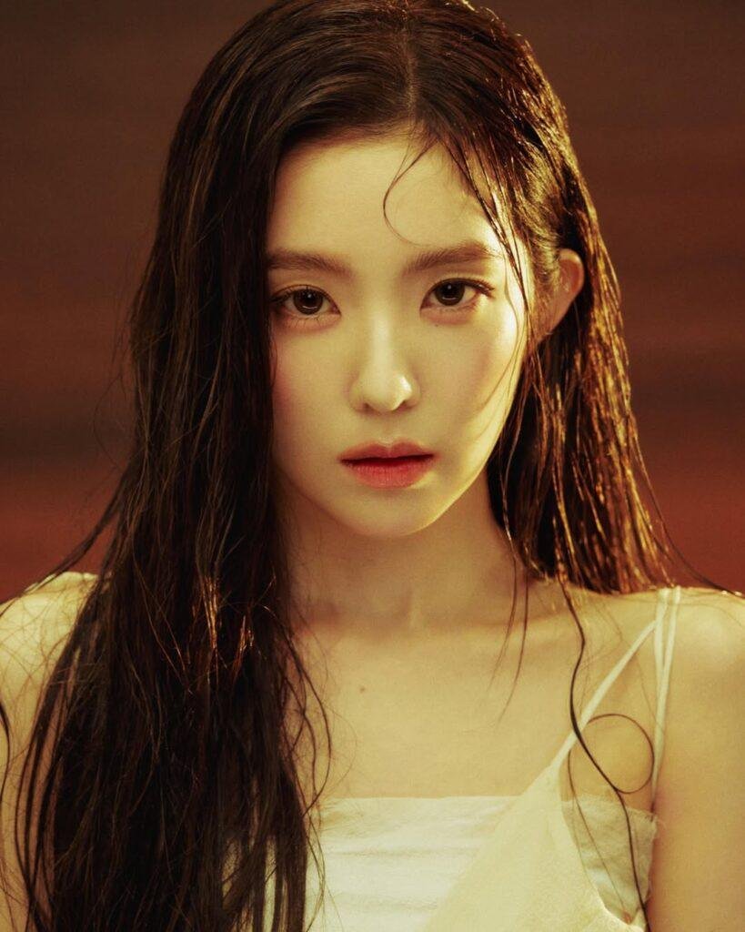 Red Velvet Irene Like a Flower official poster, Irene standing in a misty green forest with cinematic lighting