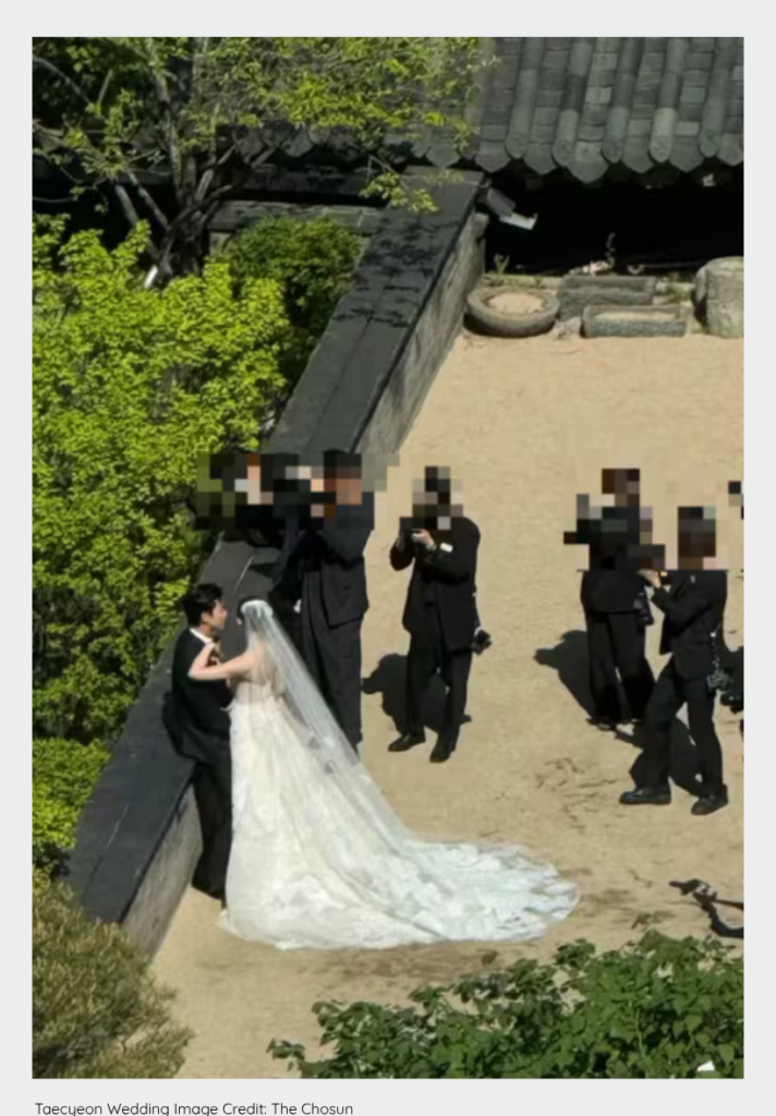 Leaked photo of Ok Taec-yeon at a private outdoor wedding ceremony