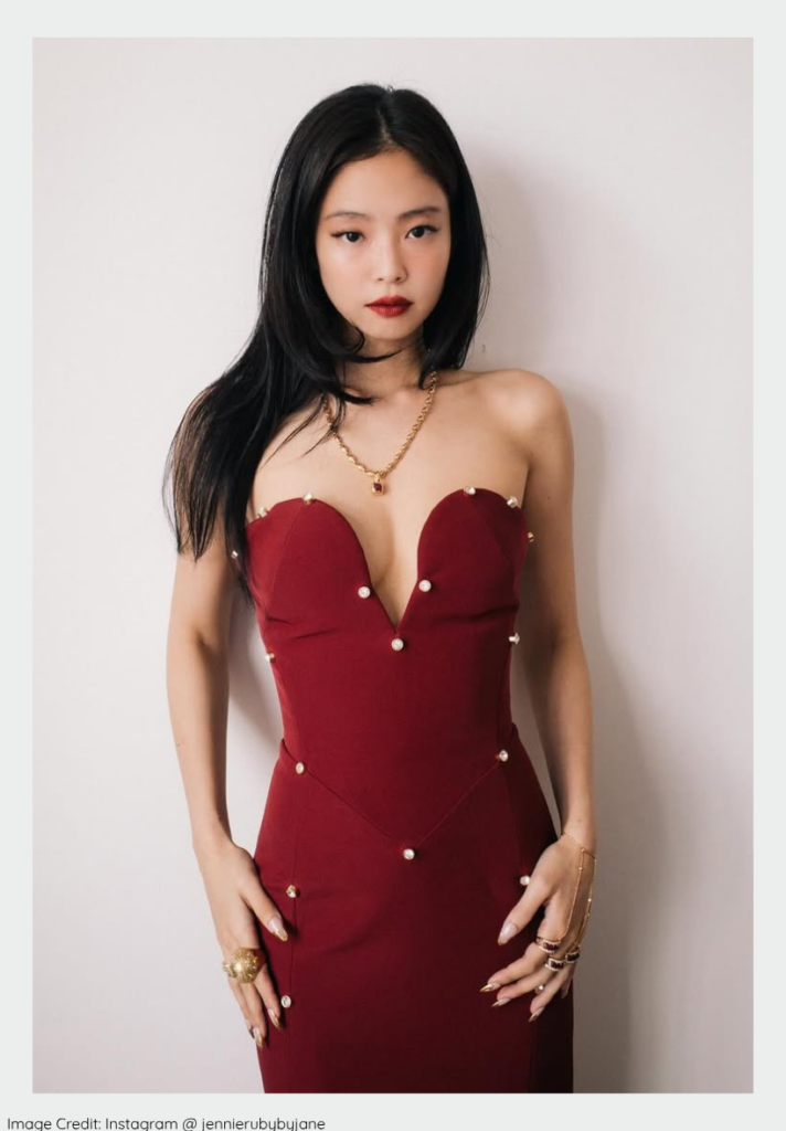 Most loved K-pop idols 2026 Jennie BLACKPINK posing at a 2026 fashion show.