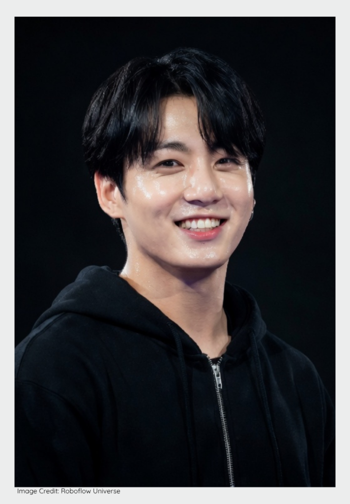 Jungkook smiling during his record-breaking global world tour