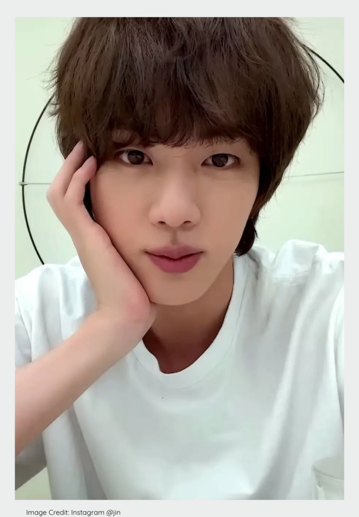 Jin of BTS attending a 2026 luxury brand event in Milan.