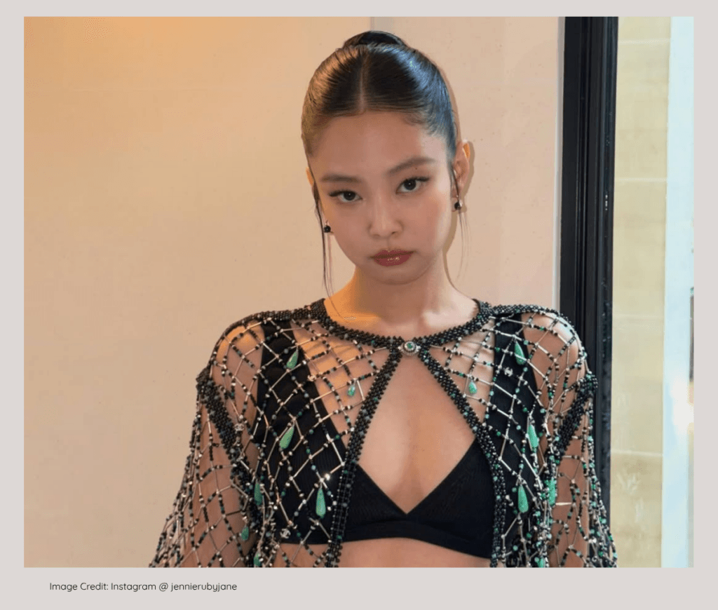 BLACKPINK Jennie posing in luxury fashion, raised in an affluent family