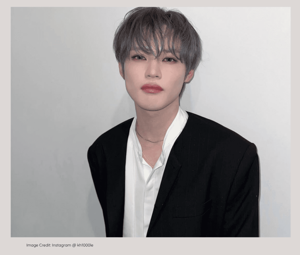NCT Chenle performing on stage, known for his wealthy family background.