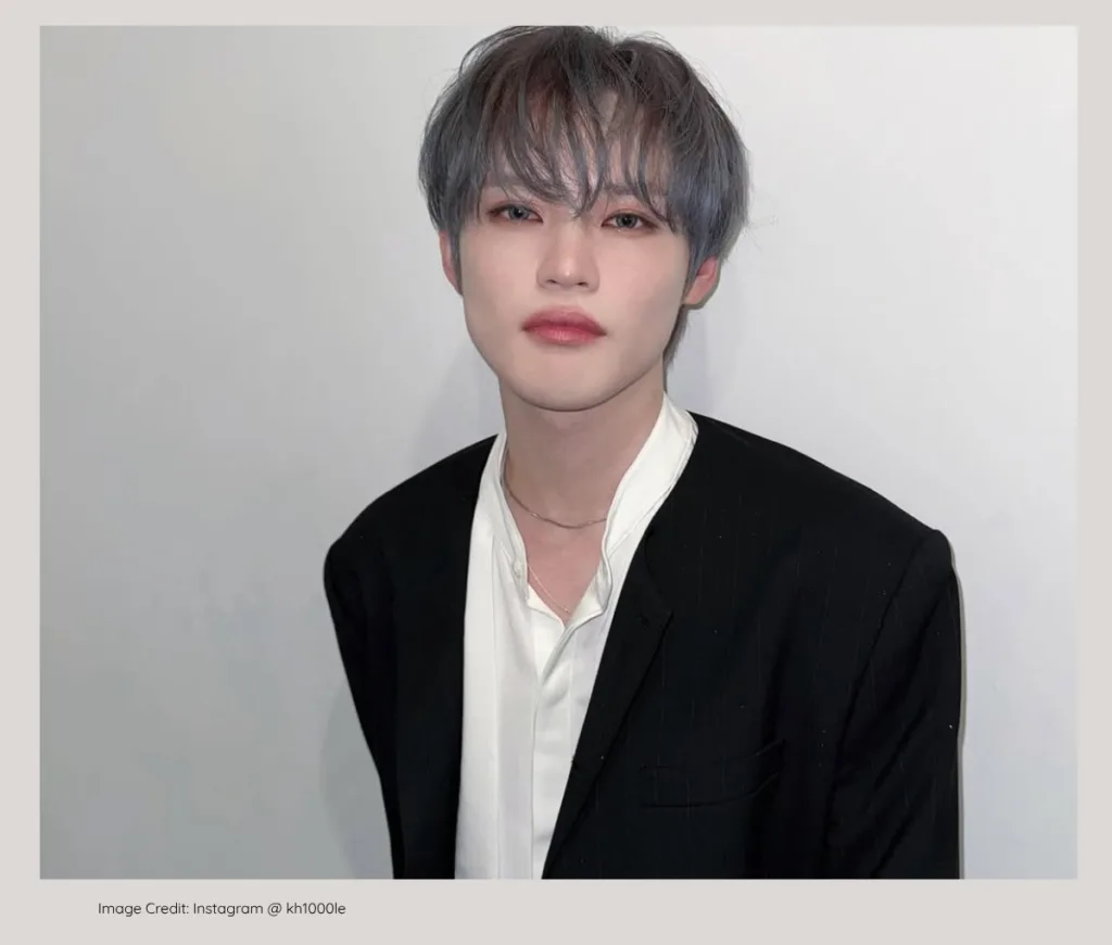 NCT Chenle performing on stage, known for his wealthy family background.