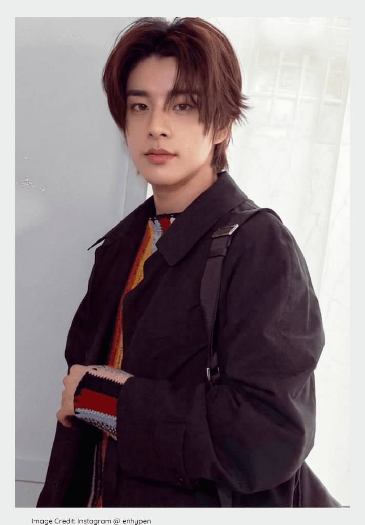 ENHYPEN member Jake, known for his handsome and youthful K-pop appearance.