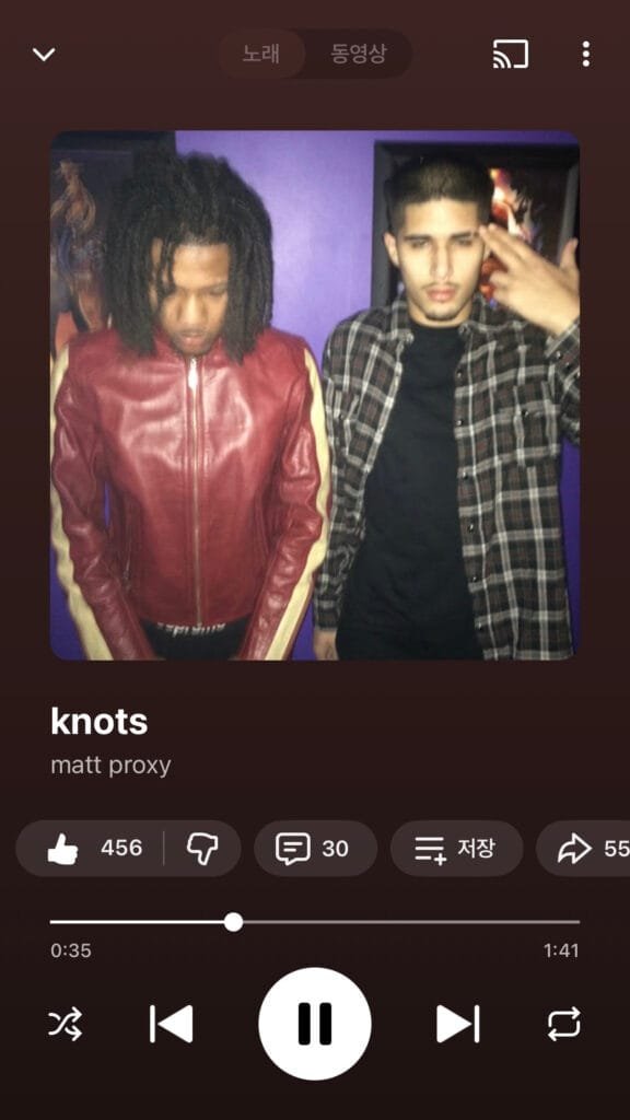 Matt Proxy music track knots on YouTube Music player with cover art